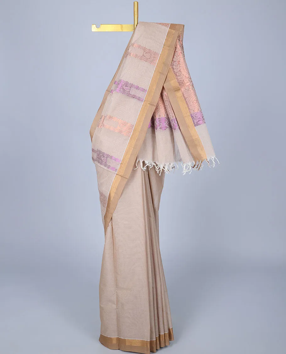 Cream cotton saree with unique designs, plain border & pallu of intricate designs