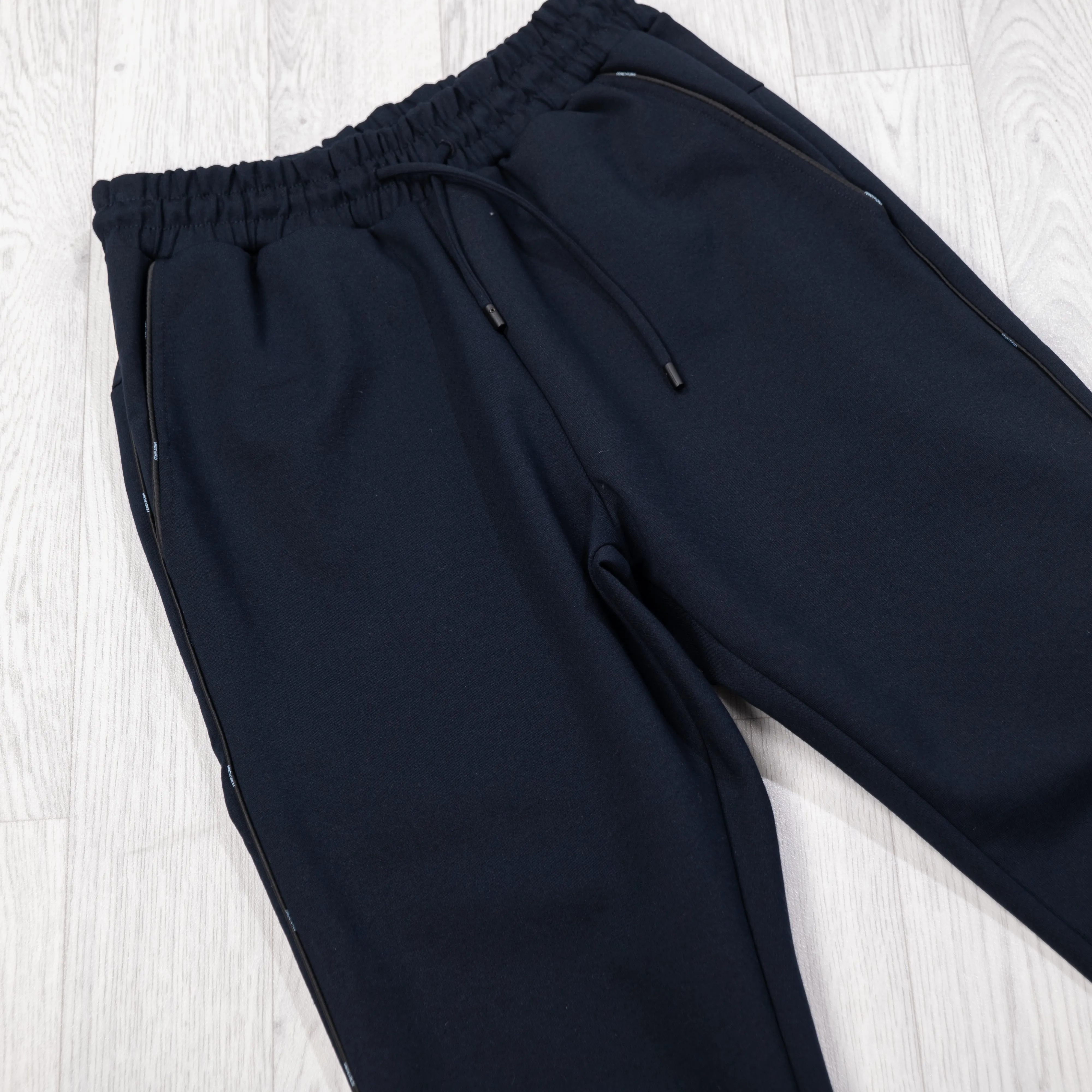 Navy Piped Logo Pants.